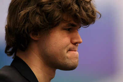Magnus Carlsen ponders his next move during a chess tournament.
